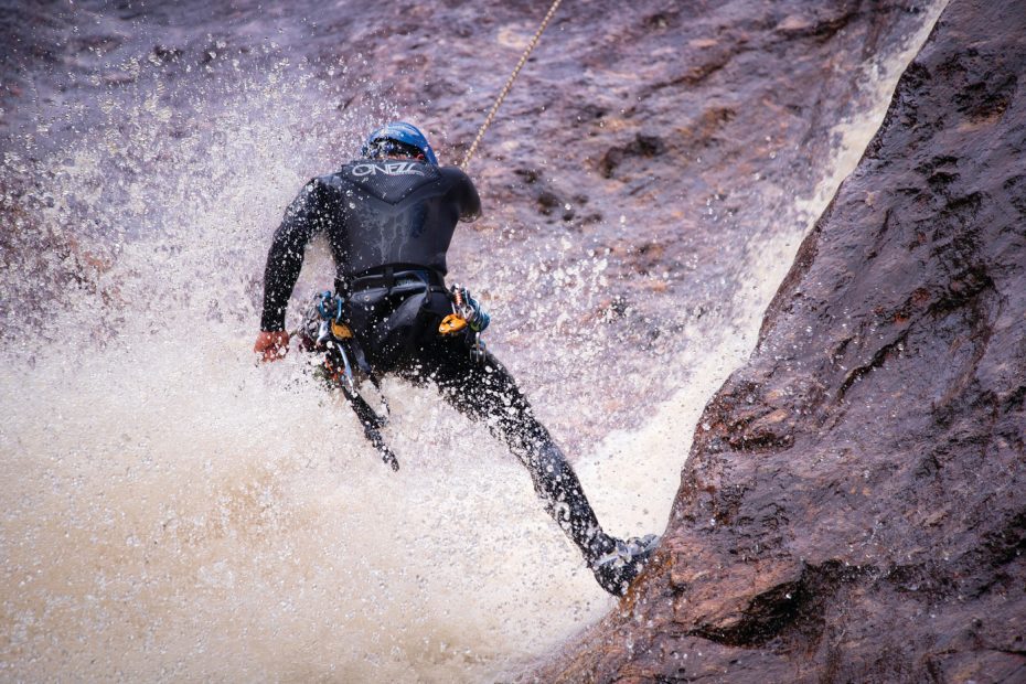 Man canyoning in Machinery Canyon near Cradle Mountain