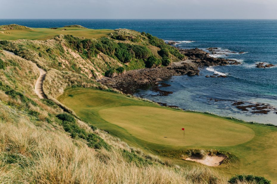 View over green at Cape Wickham Golf Course with ocean in background on King Island