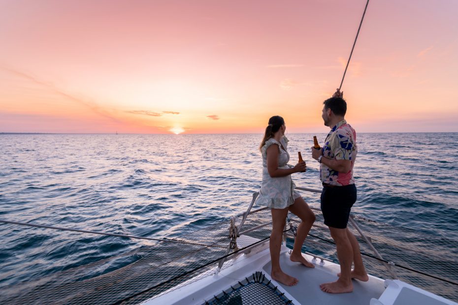 Enjoying a drink on Champagne Sunset Sail in Darwin