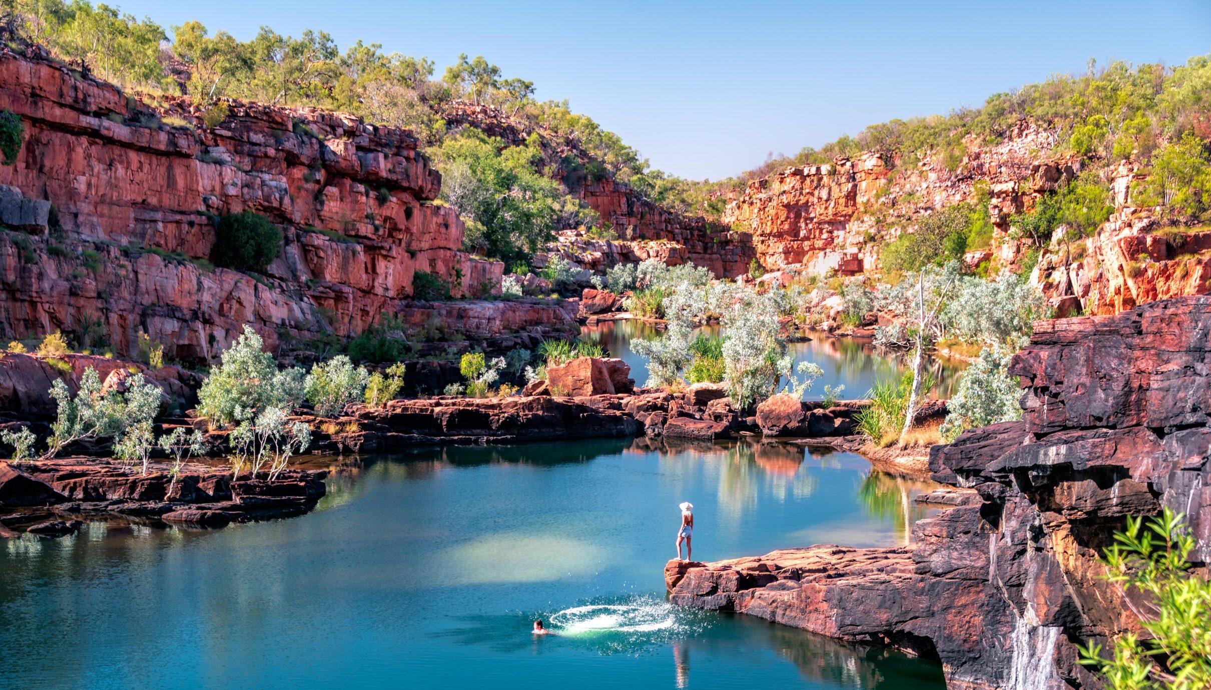 A woman on a rock at Manning Gorge on the Gibb River Road.