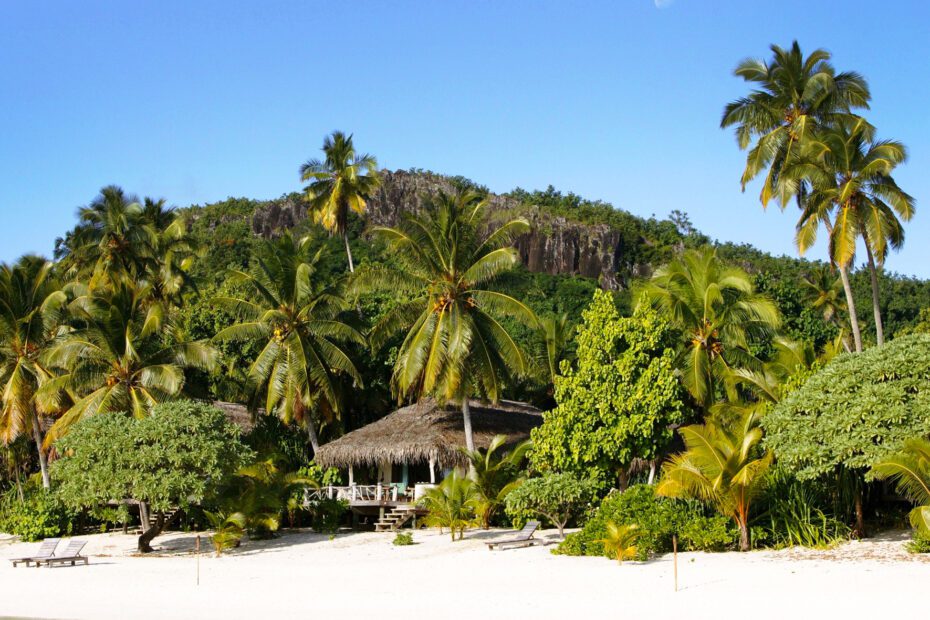 View of bure on beach at Pacific Resort Aitutaki