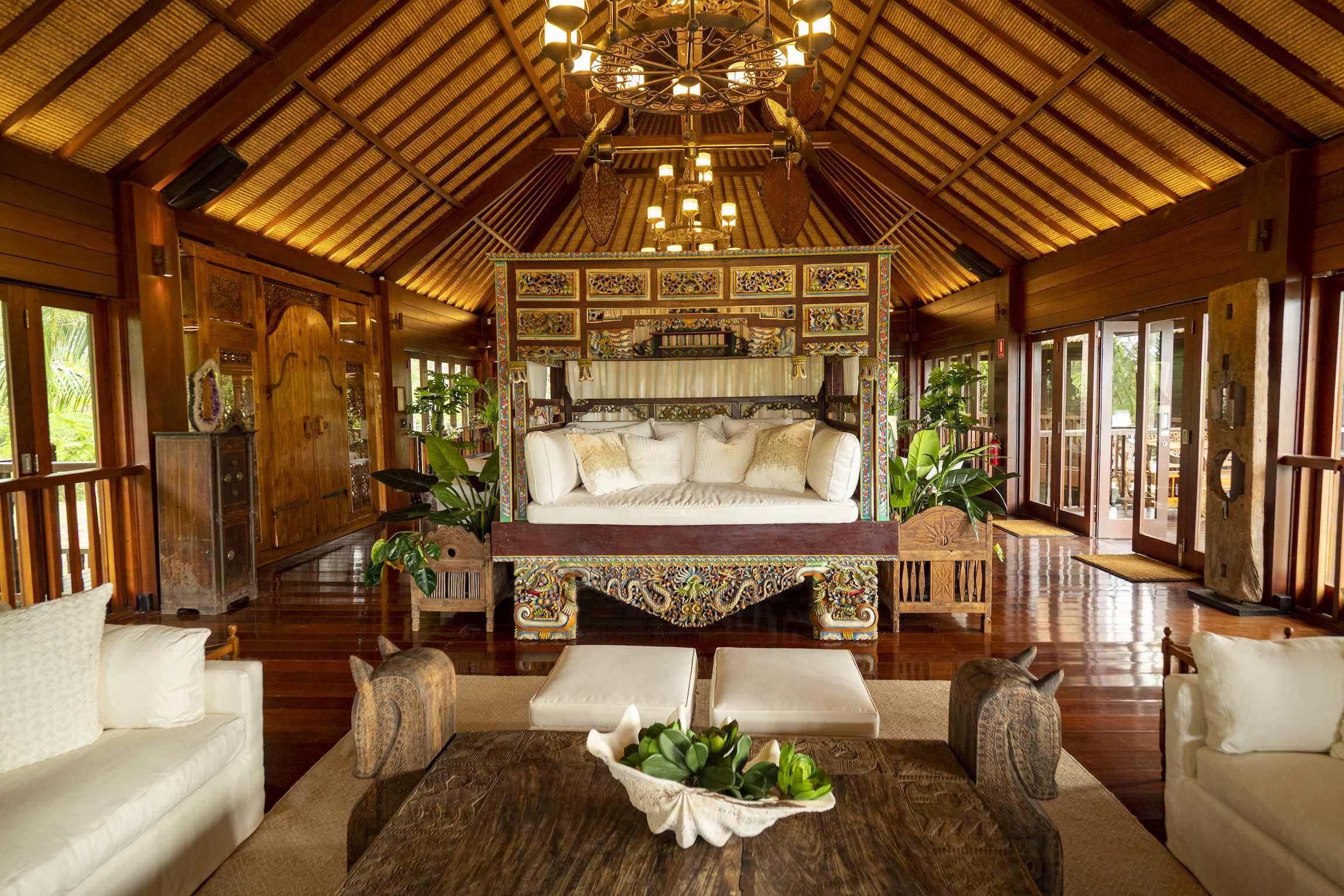 Ornate bed inside Makepeace Island