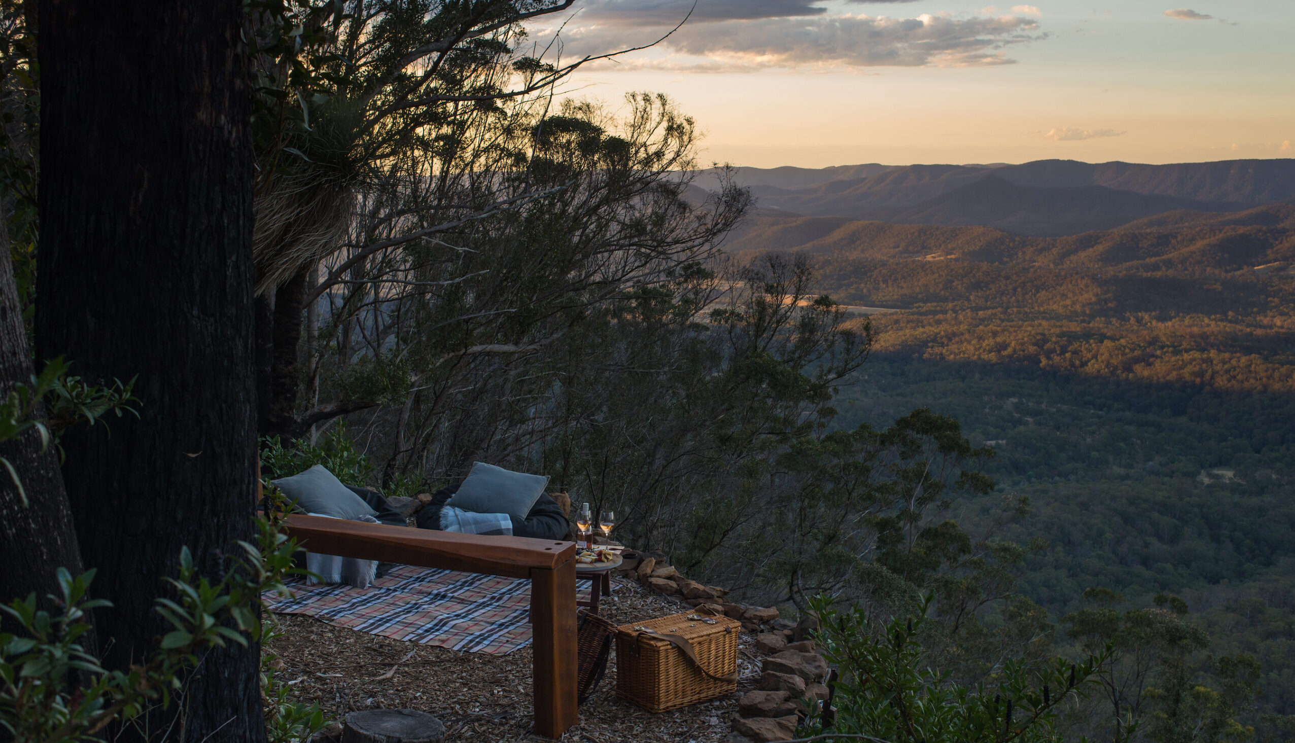 Picnic with wine looking out over the valley at Spicers Peak Lodge