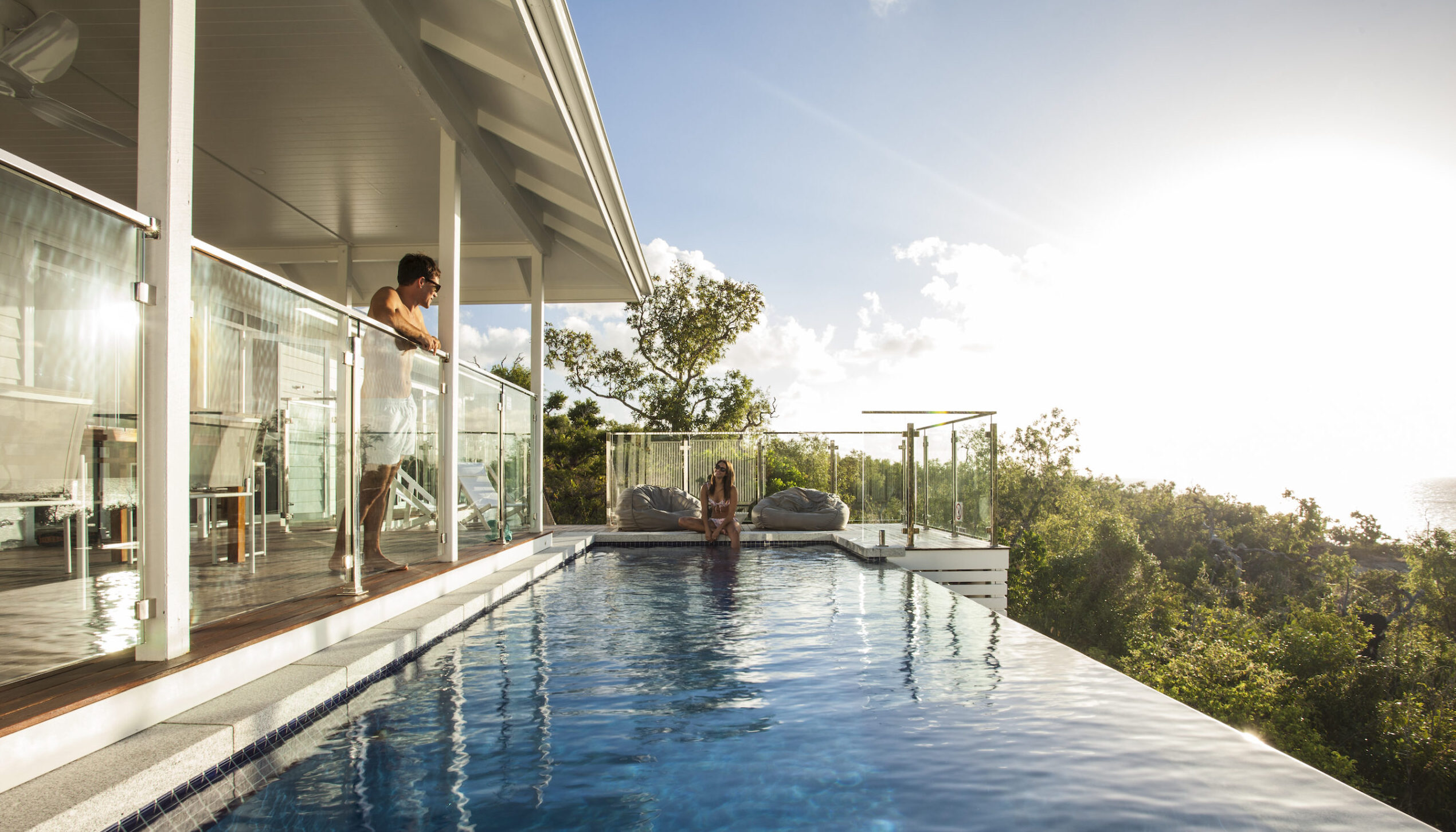Couple by the private plunge pool at The Villa on Lizard Island