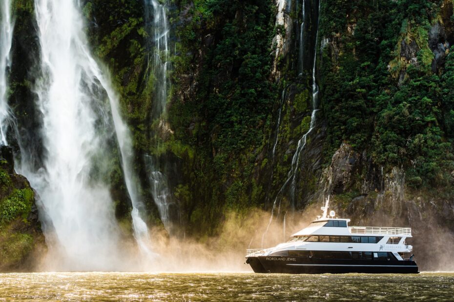 Fiordland Jewel under waterfall in Milford Sound